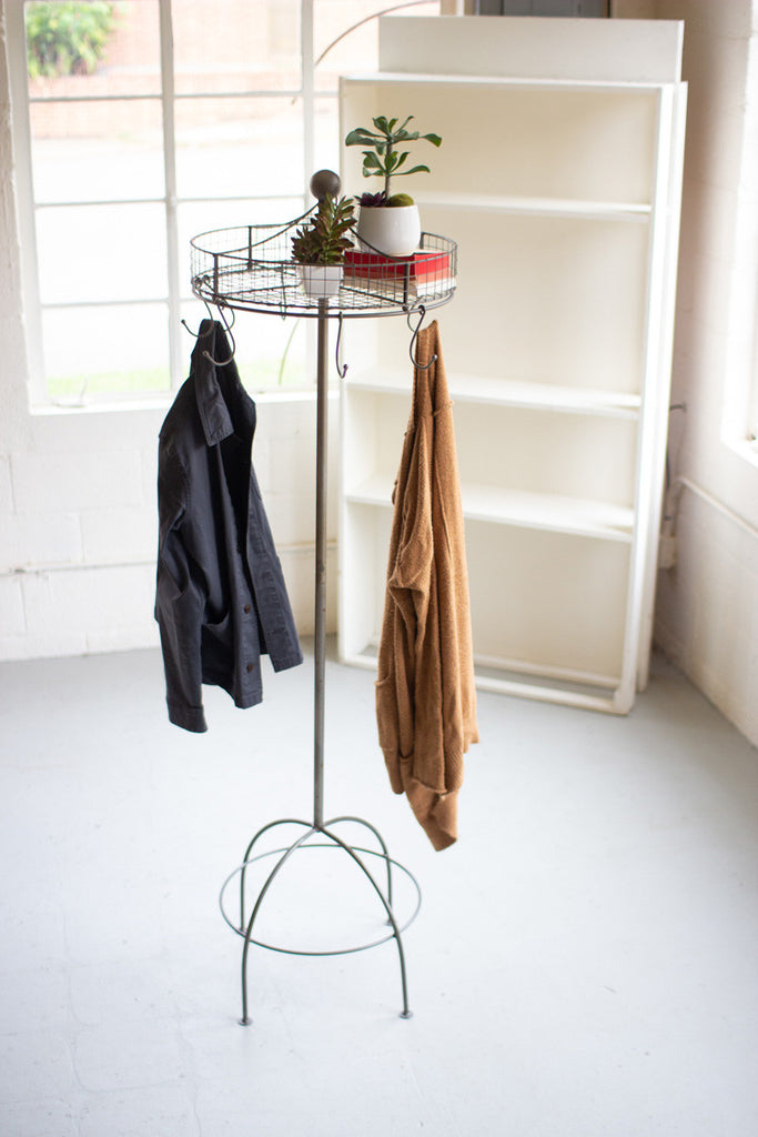 Spinning Basket And Clothes Rack On Tall Stand