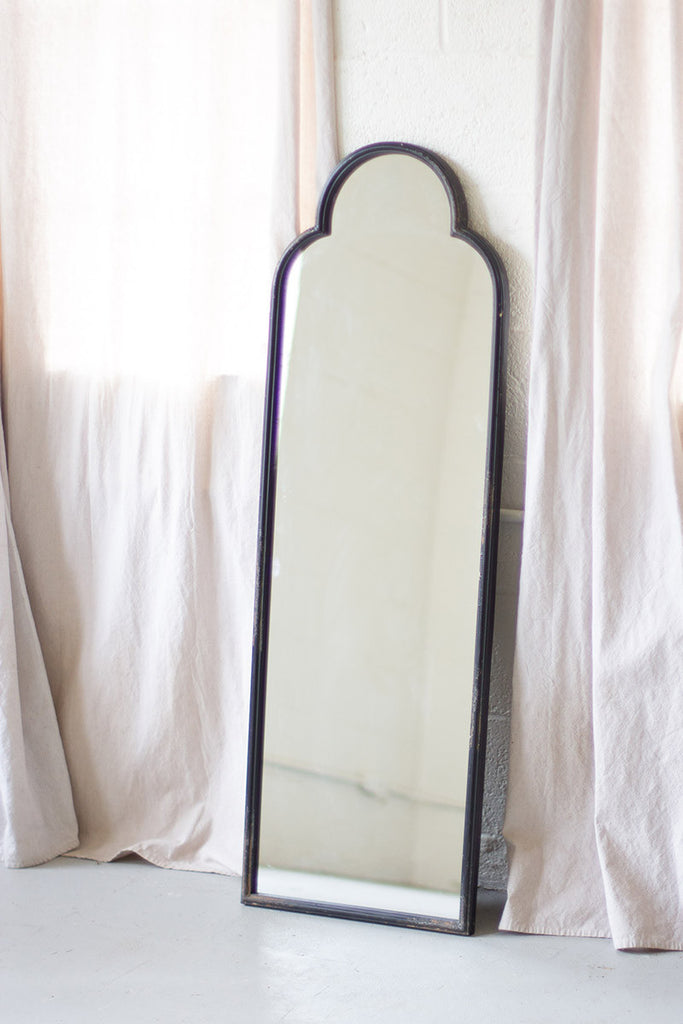 antique black iron mirror with arched top
