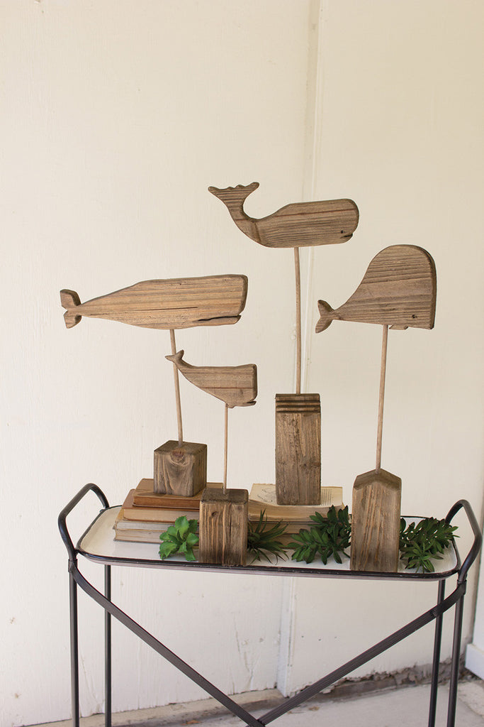 set of 4 recycled wooden whales on stands