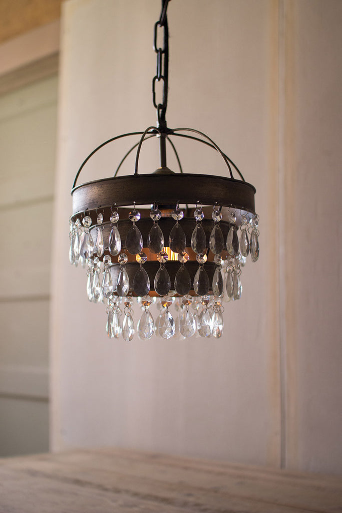 pendant lamp with layered shade and hanging gems
