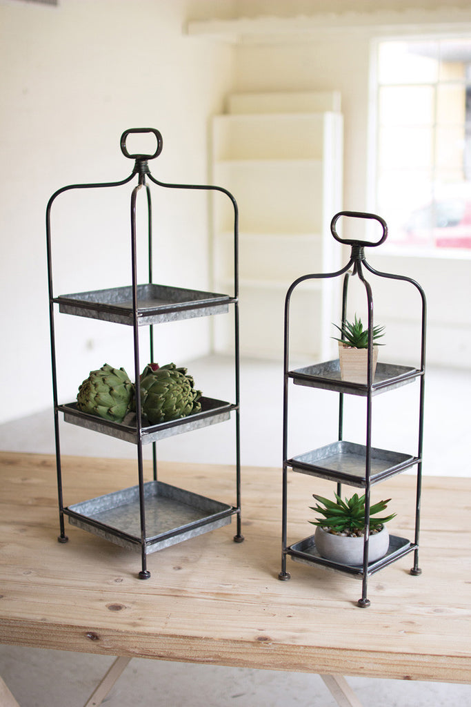 set of two tall metal display stands with galvanized trays