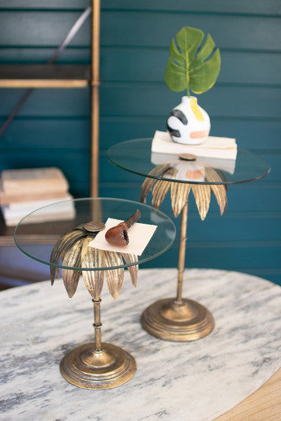 set of two palm tree display stands with glass tops