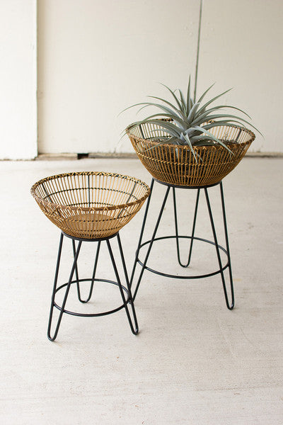set of two round bamboo baskets on metal stands